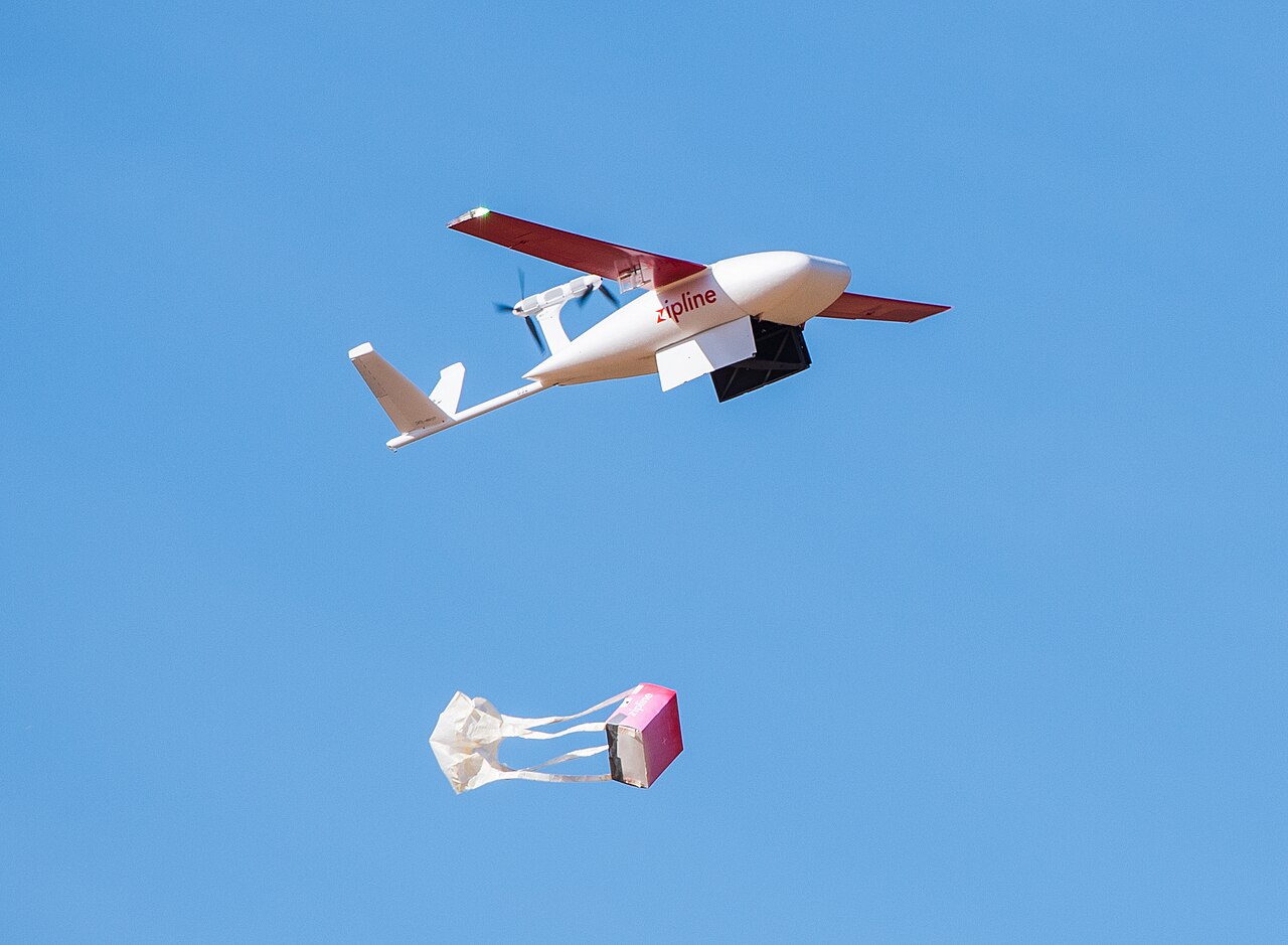 Delivery drone dropping a package for last-mile express service